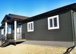 Halcyon Homes - Exterior Fiber cement siding stacked stone & acrylic parging